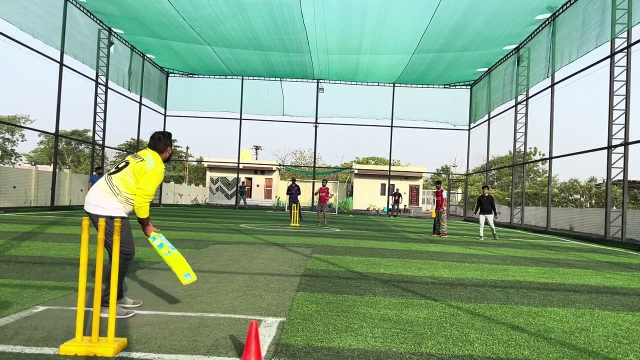 A turf cricket match in action