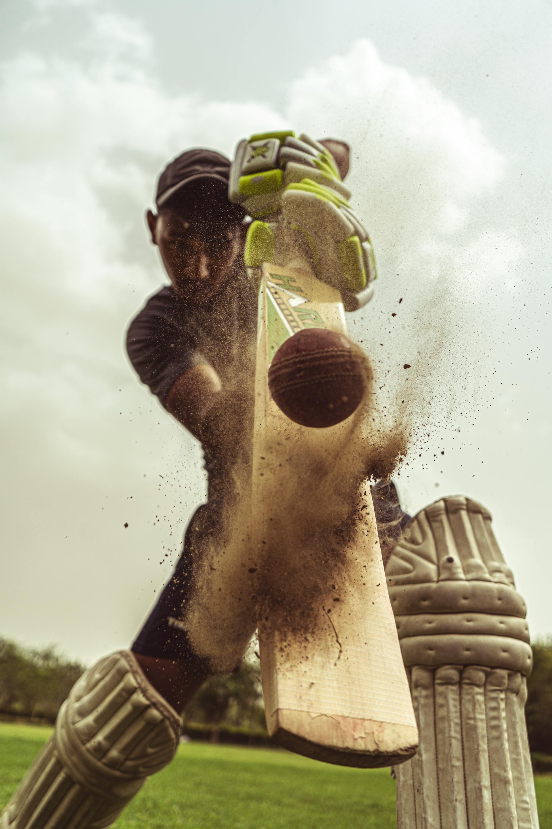 A batsman playing a power shot in a local cricket match