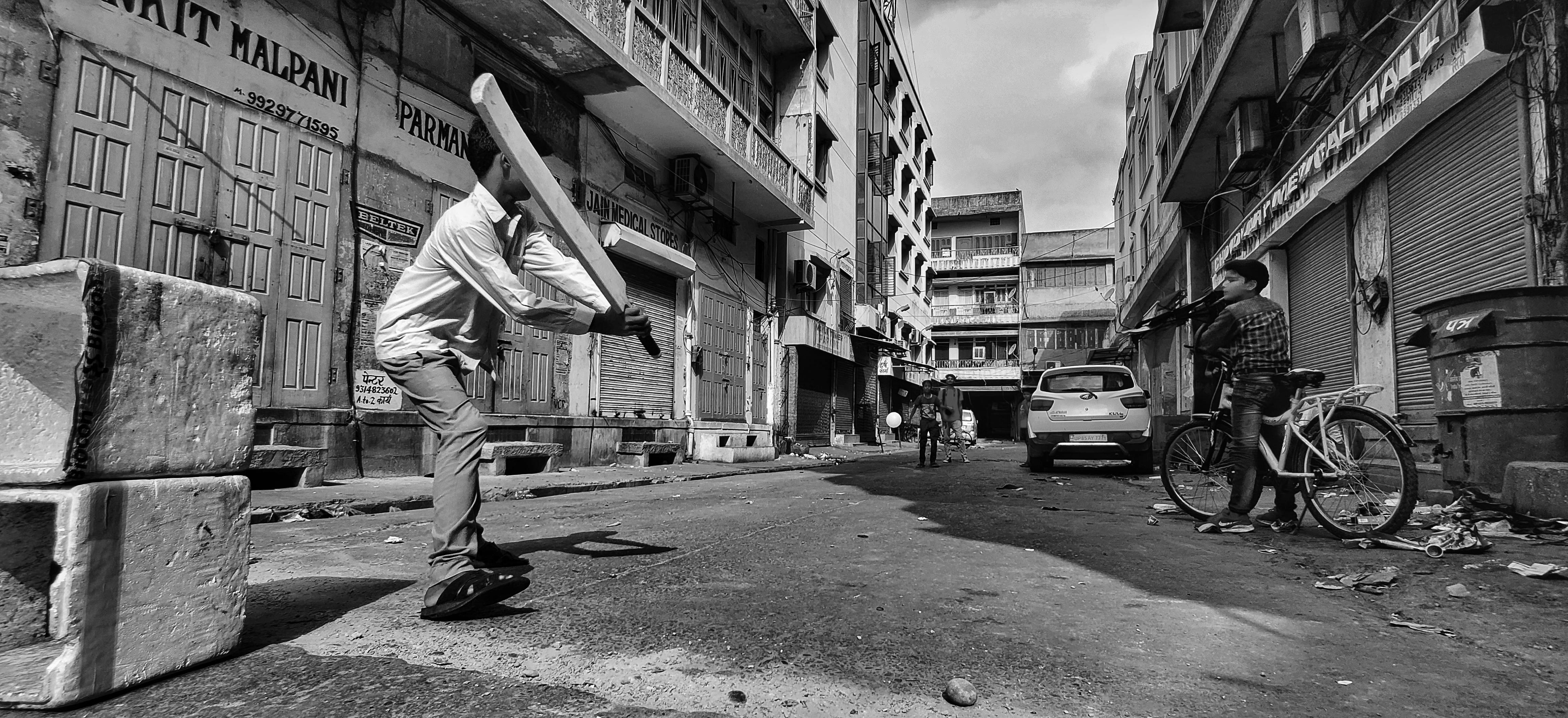 A street cricket match